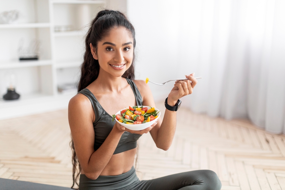 Cheerful,Attractive,Sporty,Young,Indian,Woman,In,Sportswear,Sitting,On Nutrition in Naperville, IL
